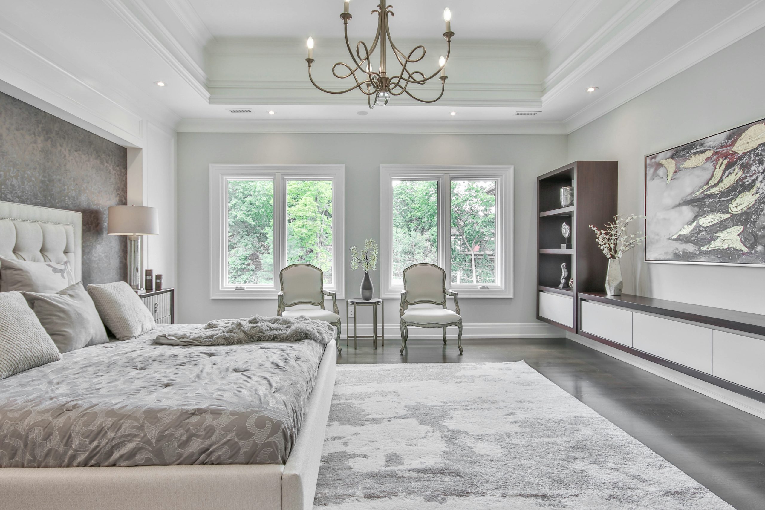 Luxury master bedroom refurbishment in London featuring bespoke furniture, layered ceiling design, and natural lighting – by AT Alliance Ltd.